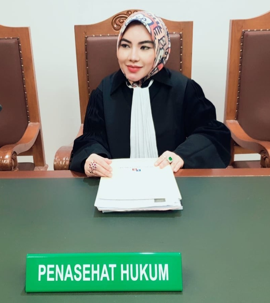 DR. (c) ERI ROSSATRIA AZ, S.H., M.H.